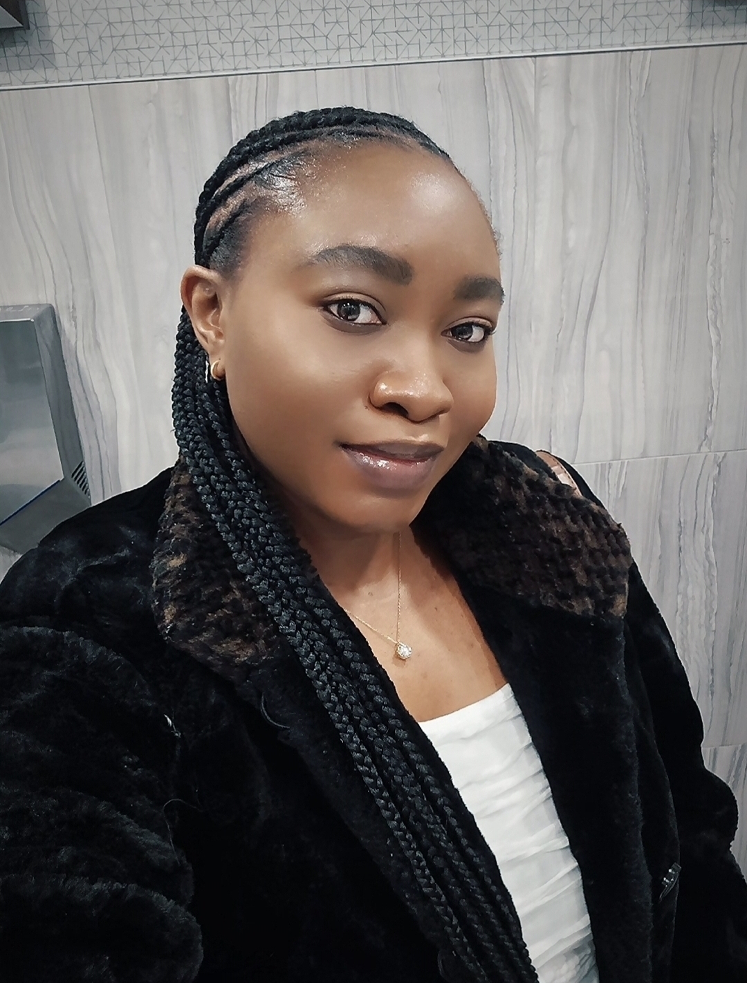 Portrait of Tosin Thrive